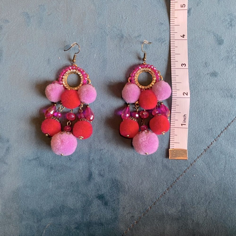 Pink pompom dangly earrings